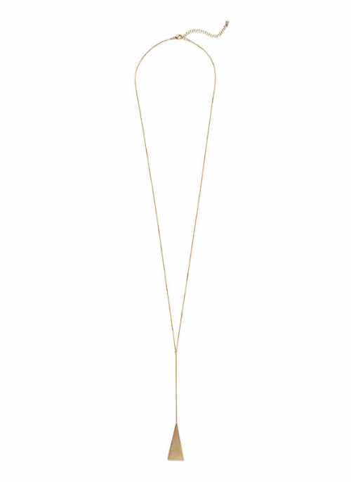 "Archer Y-Necklace in Gold by Slate – a 14K gold-plated brass Y-neck necklace featuring an elongated triangle pendant on a delicate cable chain. Measures 30” with a 3” extender and finished in a high-polish shine. Donated by Rocksbox.